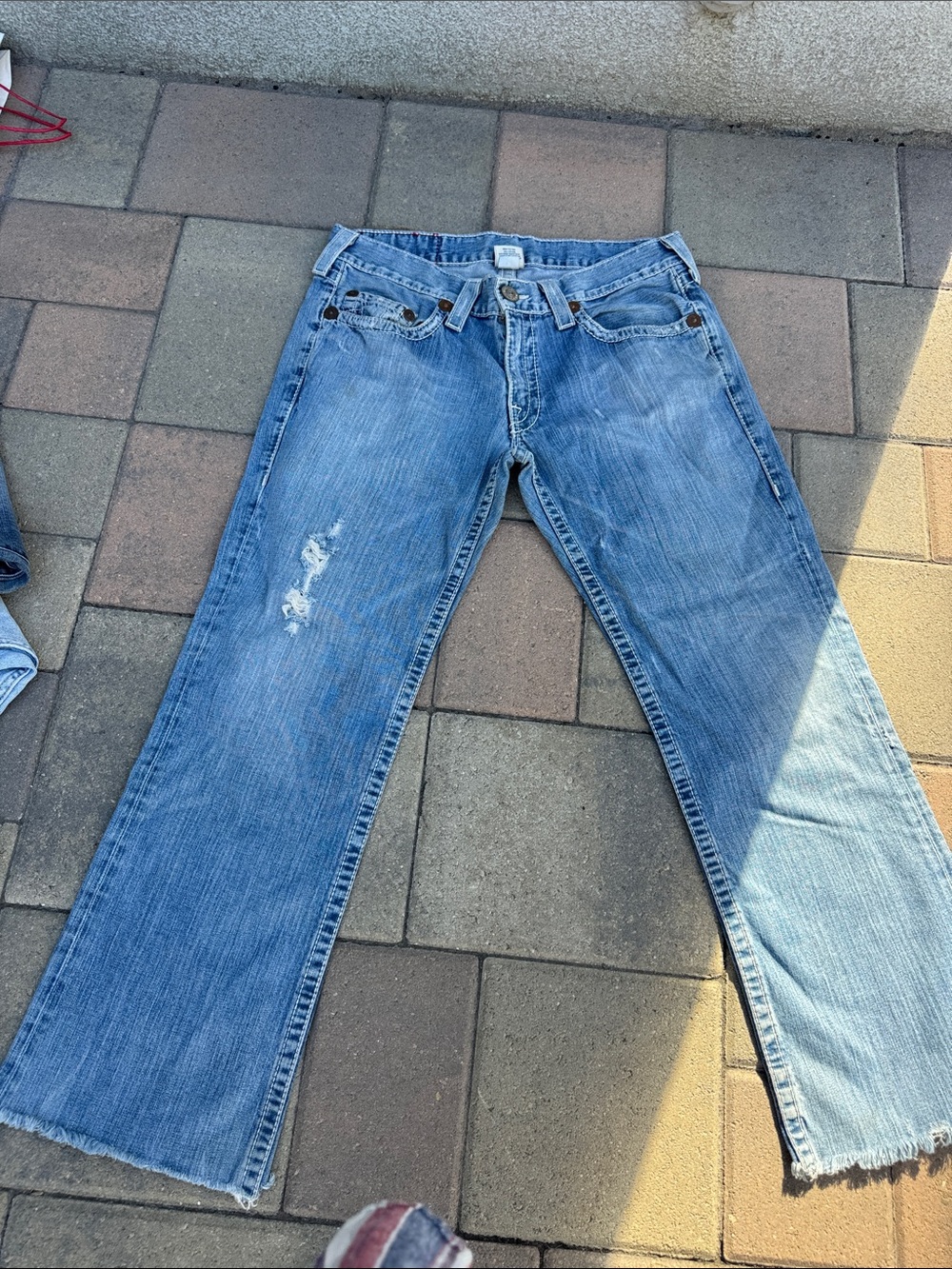True Religion Light Blue Flare Jeans with Distressed Detail
